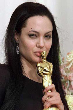 Angelina Jolie Holding Oscar Award