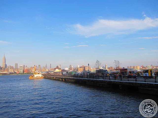 image of nyc skyline at Food trucks at Pier 13 in Hoboken, NJ