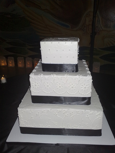 Three Tier White Square Wedding Cake With Satin Ribbon