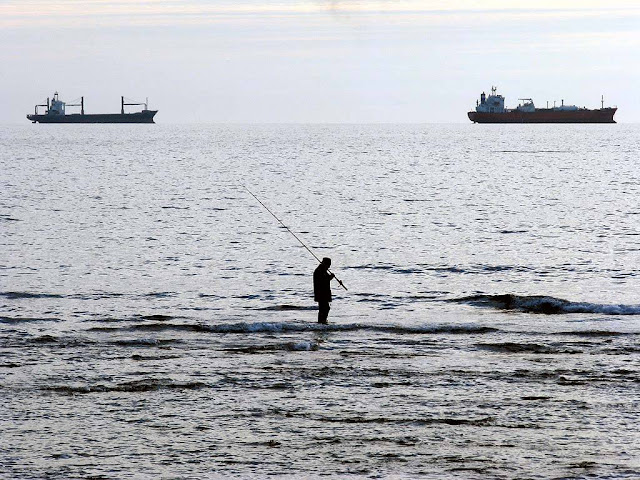 Fishing at sea, seafront, Livorno