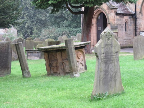 gravestones and a tomb