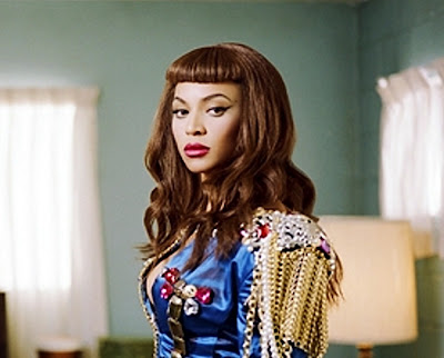 Closeup picture of Beyonce in the Telephone video Beyonce jacket and 