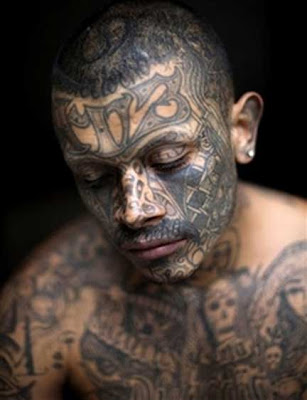 gang related tattoos. by their tattoos (biker,