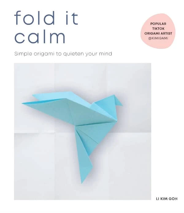 book cover features light blue folded paper bird