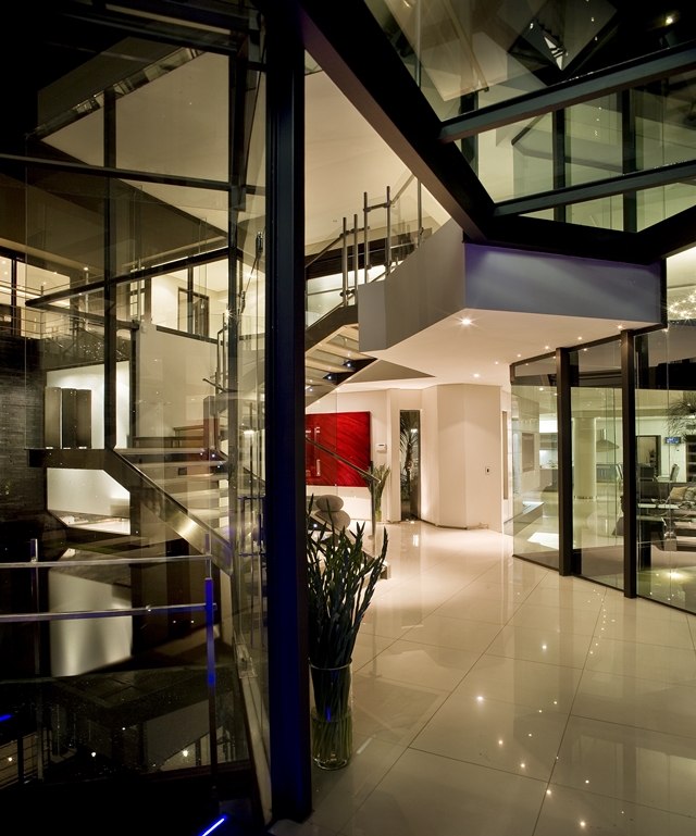 Steel and glass staircase in the hallway