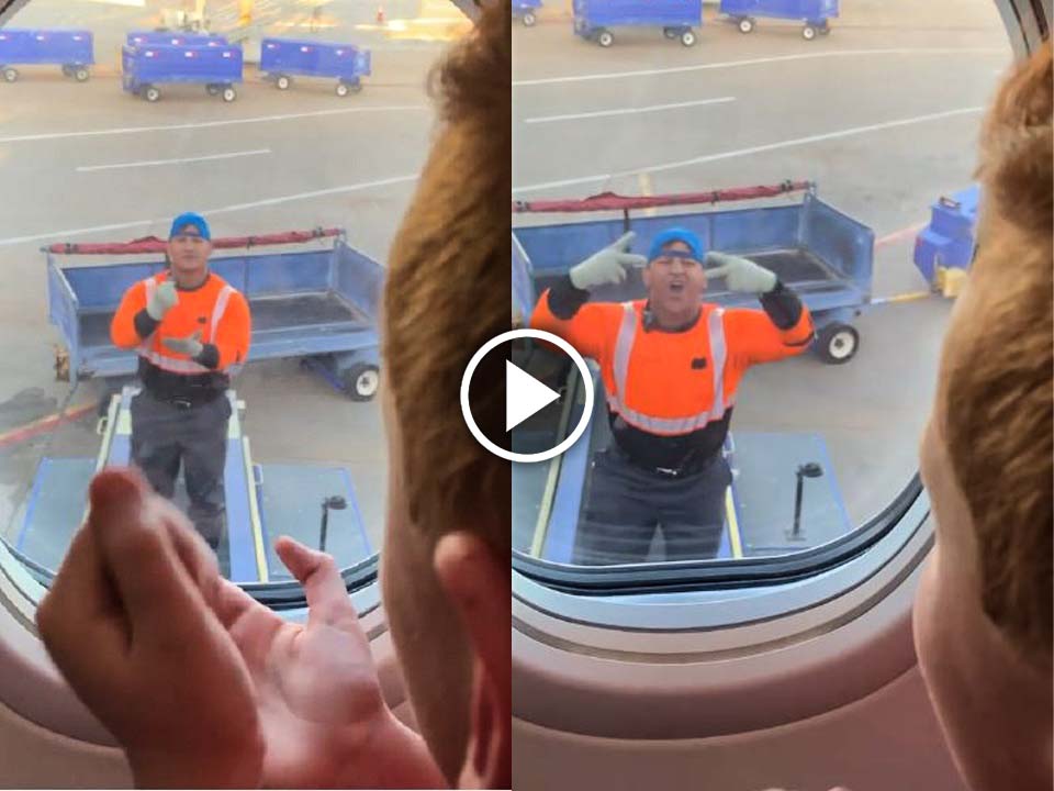 a kid playing rock, paper, scissors with a Southwest Airlines employee