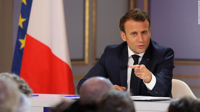 الرئيس الفرنسي: "منازلنا مشتعلة"