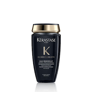 A sleek bottle of Kerastase Chronologiste Bain Regenerant Shampoo, designed to rejuvenate and nourish hair, displayed with its distinctive luxurious branding.
