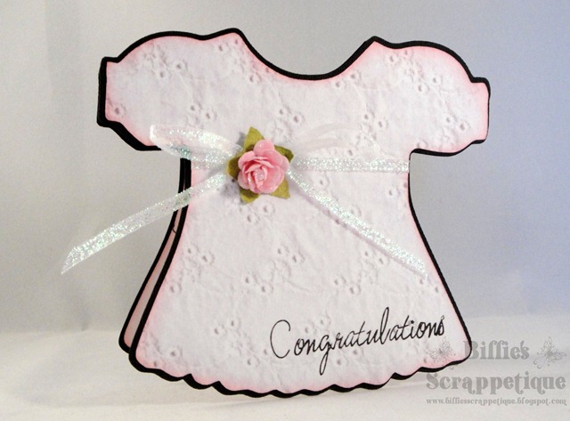 For this project I cut 5 layers of paper using a doll dress SVG file 