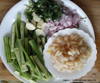 Prawns, moringa drumsticks, garlic,green chili, curry leaves and onions