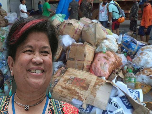 12 vans of foreign relief goods for Yolanda victims left to rot by Dinky Soliman