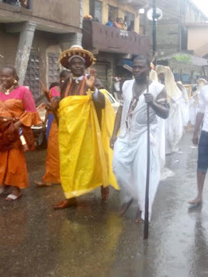 Photos: Eyo masquerades defy rainfall, move around in their attire