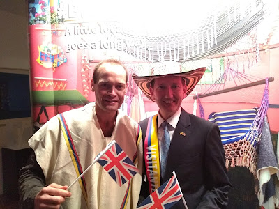 Drunk almost to death on the culture wars. Wrong Way Corrigan "proudly" waves the Union Jack with the UK's ambassador to Colombia, Colin Martin-Reynolds.