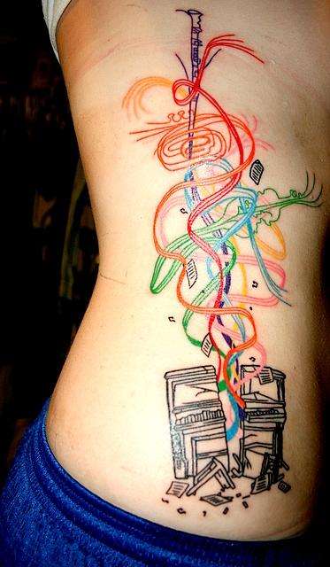 Boombox Tattoo With Music Notes Music tattoo designs