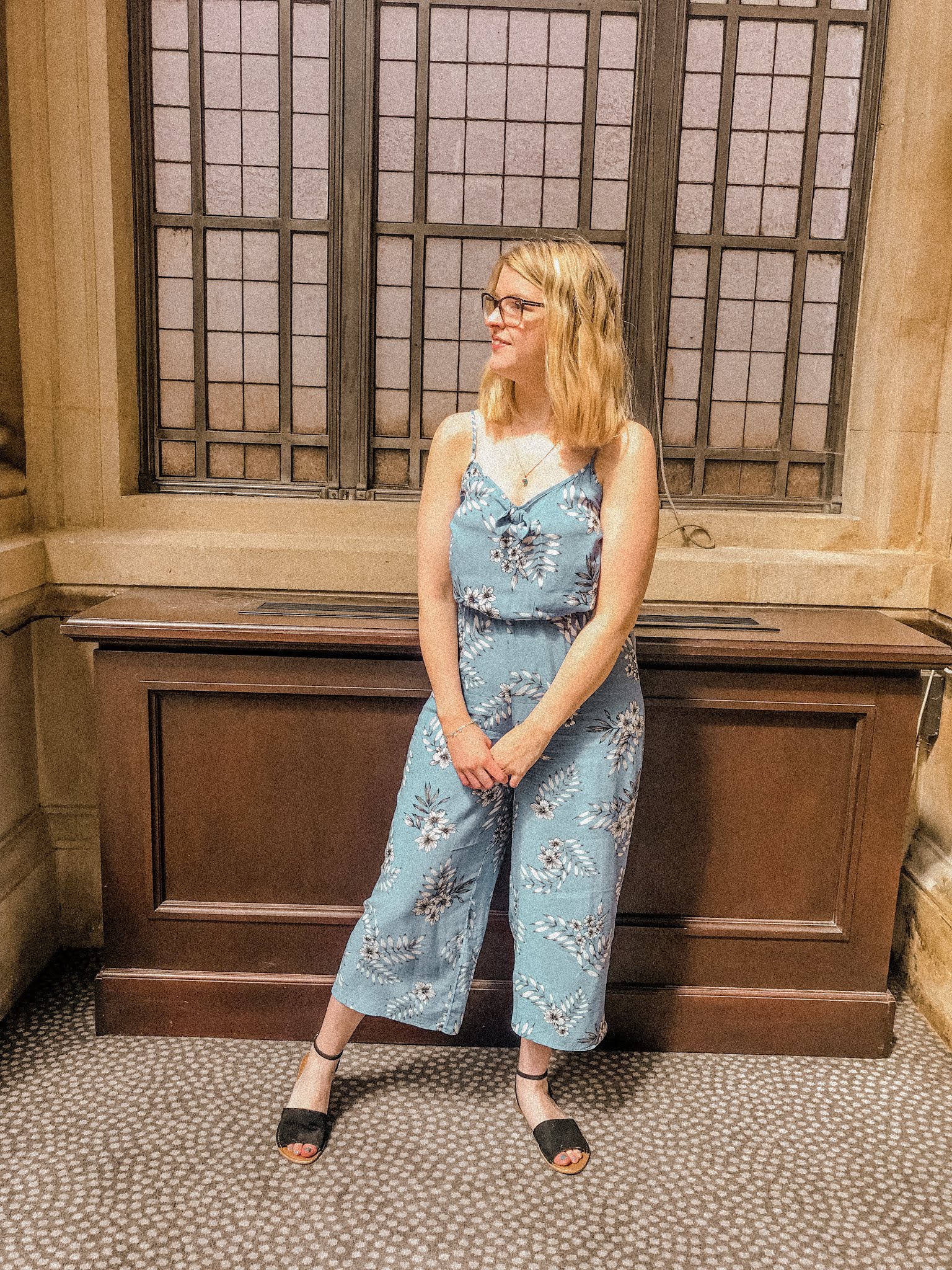 Blonde Girl Smiling in floral blue jumpsuit - Bristol Blogging Event