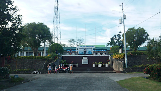 street view of jose rizal monument and municipal hall up a hill in saint bernard southern leyte