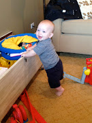 Another new trick? Caleb can now pull himself up and stand on his own!