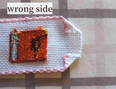 Fold the corners towards the wrong side