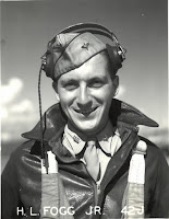 A portrait of Howard Fogg in his WWII aviator flight gear with "J. L. Fogg Jr. 42J" printed across the bottom in white lettering.