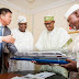 PHOTO OF THE DAY: Buhari Receives Model Electric Train From Chinese Contractor