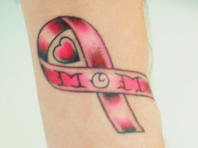 bow tattoos are tattooing by using pink tattoo ink