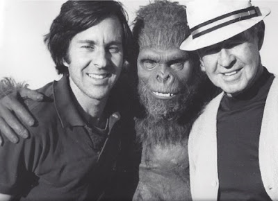 George Folsey Jr., John Landis in Rick Baker's monster makeup, and George Folsey Sr. on location shooting John Landis' first movie SCHLOCK