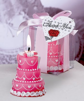 pink wedding cake candles with ribbon