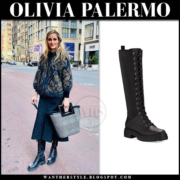 Olivia Palermo in black printed sweater, black skirt and tweed bucket bag