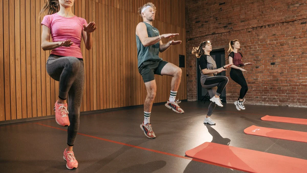 Group of People Doing High-Knees in Fitness Center
