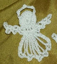 http://www.crochetmemories.com/blog/lil-thread-angels/#more-1694