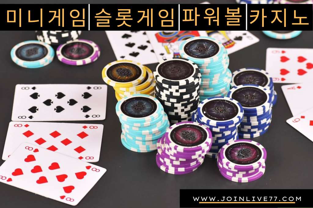 Casino chips and cards in the table for Teen Patti game.