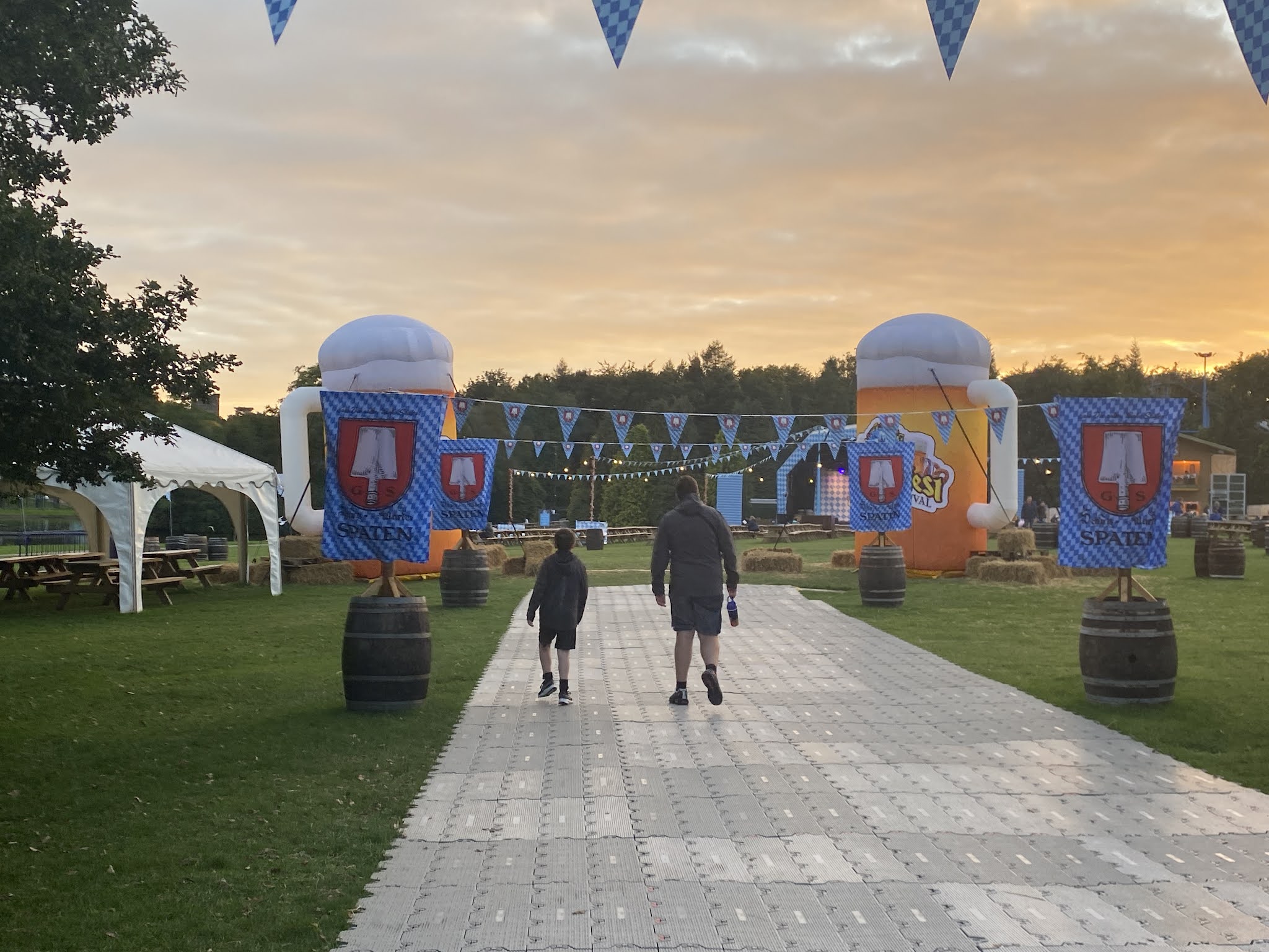 two boys walking in to Oktoberfest