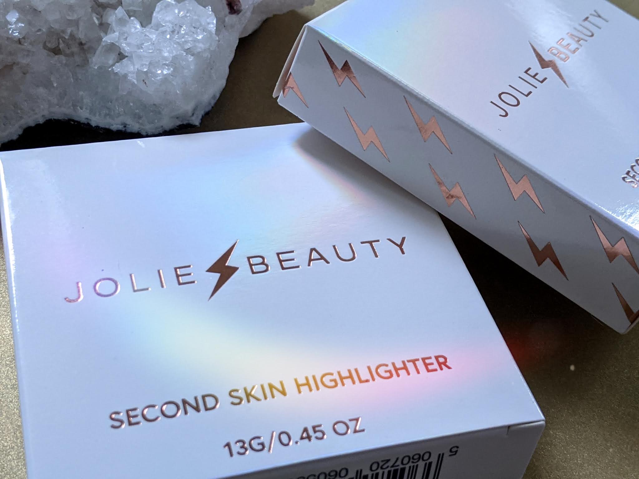 Jolie Beauty Saintly Dreaming Second Skin Highlighter on pale skin littlepackofvegans