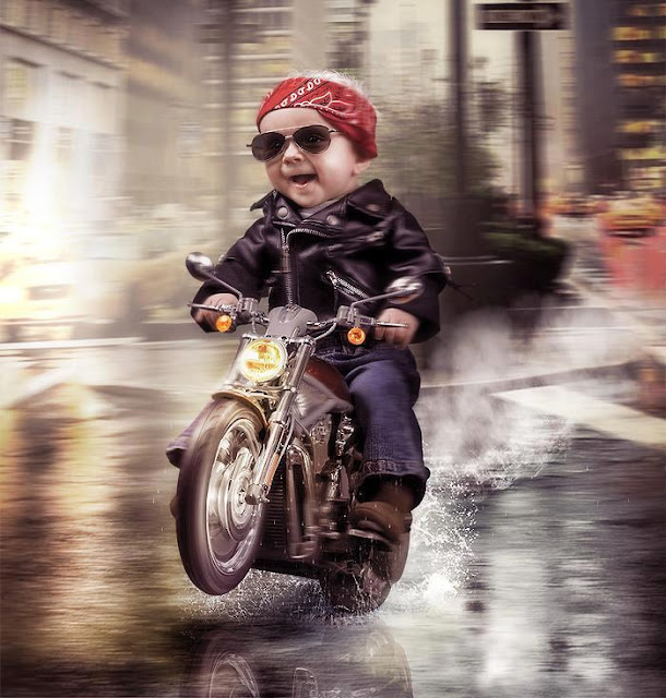 funny baby driving bike