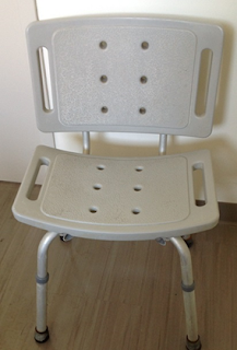 picture of a gray shower chair 