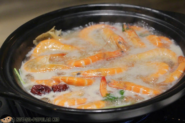 Freshly prepared Drunken Prawns with Herbs - Ming Kee