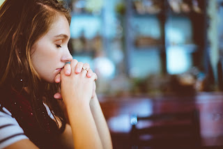 God wants to be my friend.  Young woman praying