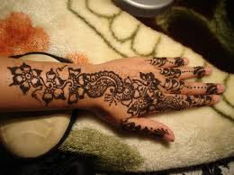 Coloring hands, legs with henna paste or mehndi is a popular practice in India,Pakistan and Arabian countries. 