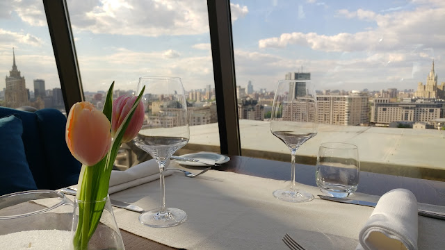 View of Moscow from a White Rabbit restaurant table with tulip and glasses