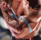 measuring massive tan biceps