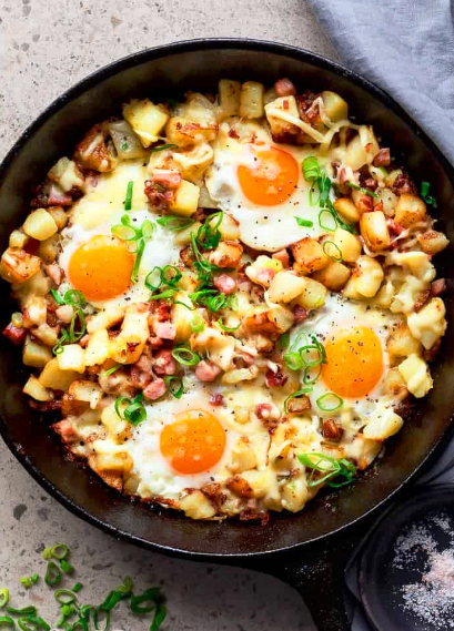 Cheesy Bacon And Egg Hash Breakfast Skillet