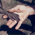 A starving boy and a missionary in Uganda, 1980