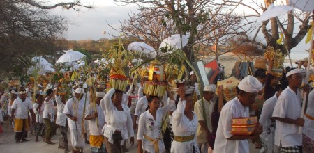 A photo of Balinese carry offerings during Nyekah ceremony. Nyekah is a ceremony performed after a cremation or Ngaben in Balinese Hinduism that symbolizes the soul's return to God.