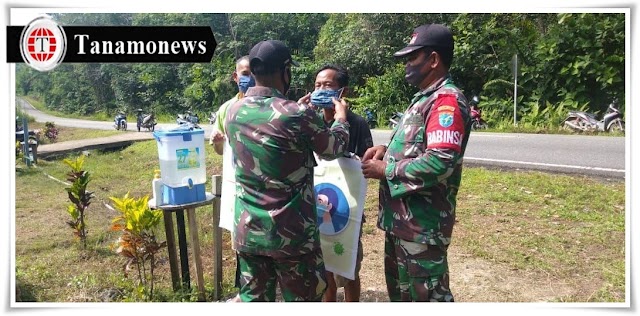 Antisipasi Covid-19 Babinsa Menghimbau Warga Agar Selalu Memakai Masker