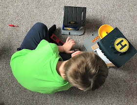 BRIO Fire Station playset being played with 