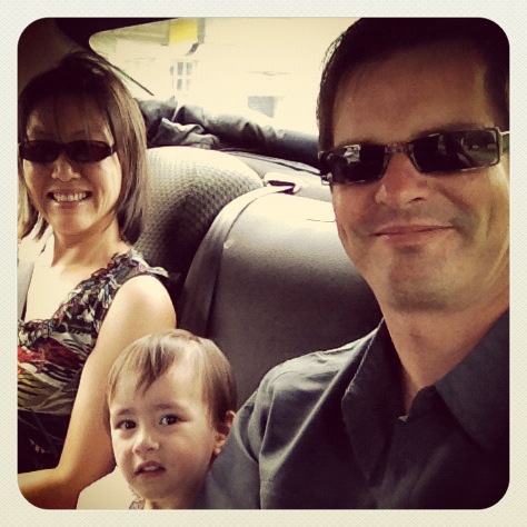 smiling family in a taxi
