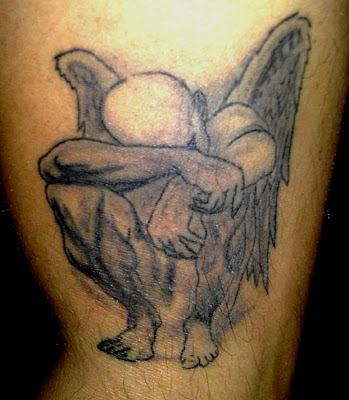 no other way to explain this Hello Kitty angel and devil tattoo photo: