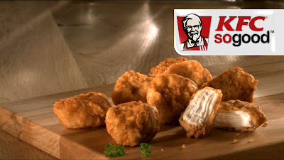 Kentucky Fried Chicken employees clean spoiled food from a store in ...