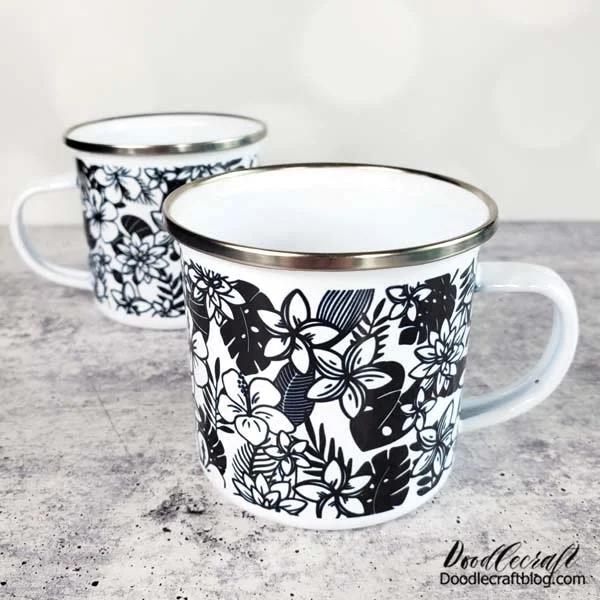 How to Sublimate Enamel Camping Mugs!  Make a custom pair of enamel camping mugs with a sublimation printer, sublimation paper and a sublimation oven.   These enamel mugs are super chic, showcasing a classic black and white tropical print!