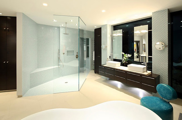 Picture of the modern bathroom with large shower cabin and dark brown furniture